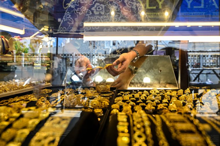 Nouveaux records pour l'or et l'argent, propulsés par le risque